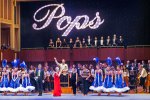 Maestro Jack Everly and Louise Pitre on stage with performers and musicians of the Indianapolis Symphony Orchestra  2019